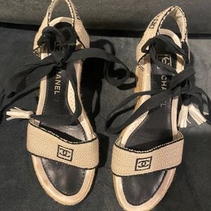 Chanel wrap around wedge size 38/8 tan with black logos woven wedge heel